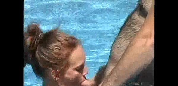  Milf gives blowjob on big hard cock outdoors in pool